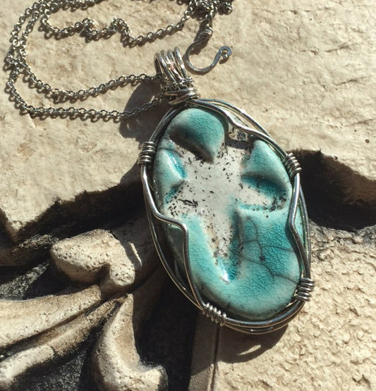"Regenera" - Raku Pendant - Silver-wrapped starfish
